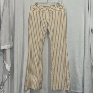 Cream colored striped boot cut pants